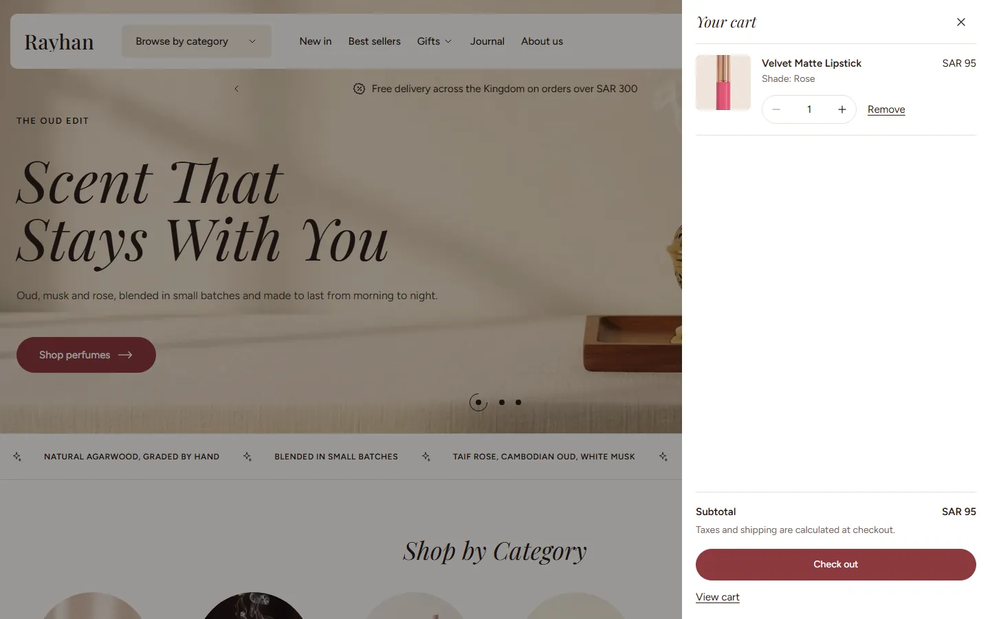 The cart drawer open with a product in it in the Rayhan design